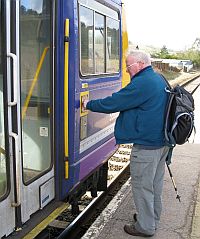walker getting on a train